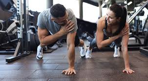 Toning Bingo Wings: Your Ultimate Guide to Sculpting Sleek Arms at the Gym 3 Fitness trainer demonstrating arm toning exercises Epping